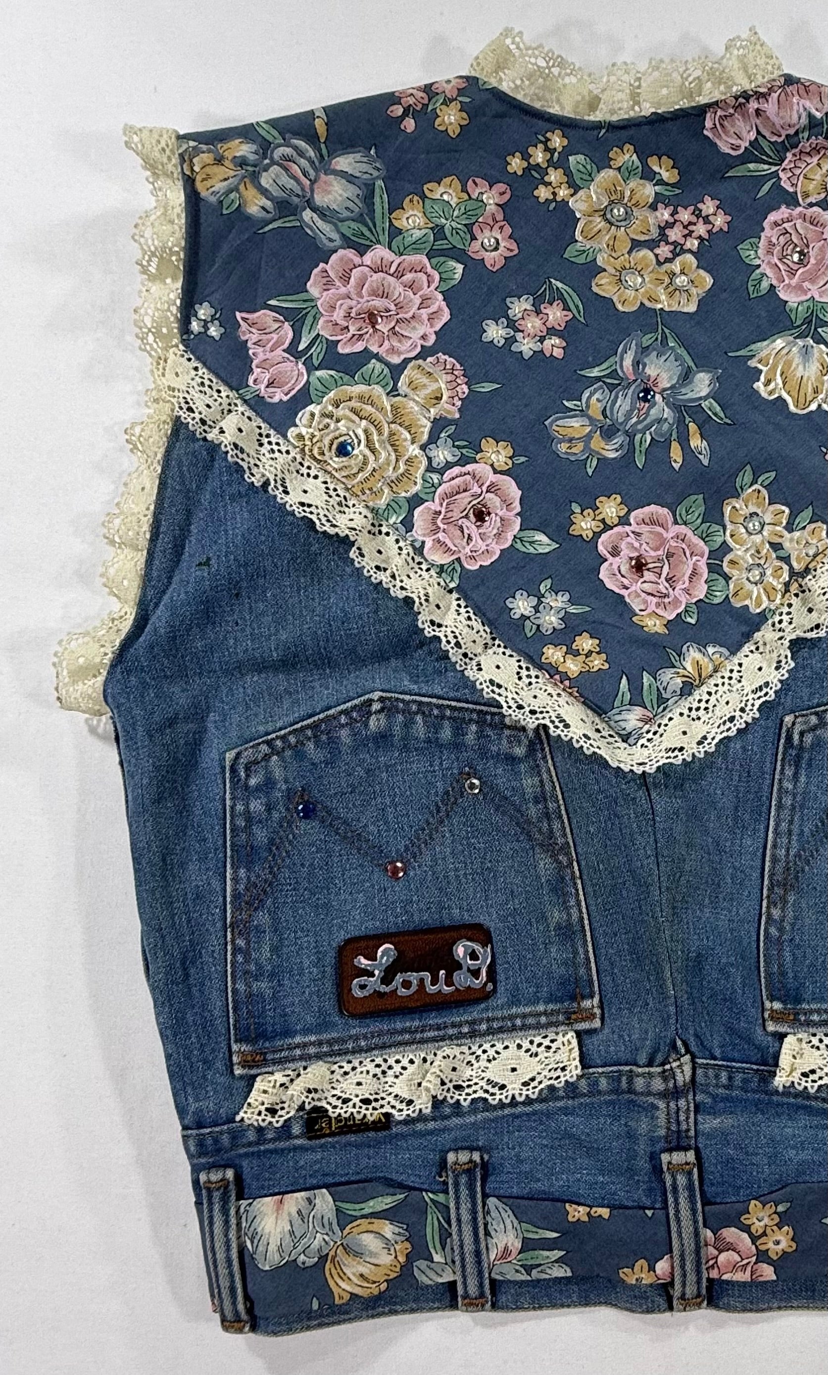 Vintage upcycled western denim vest with floral patches, custom lace trim, rhinestones and pearl accents - Back