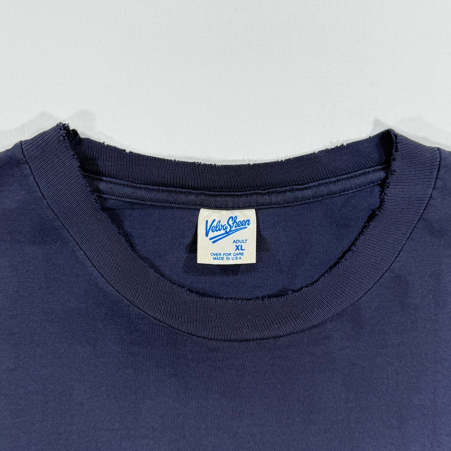 Worn out collar and label tag