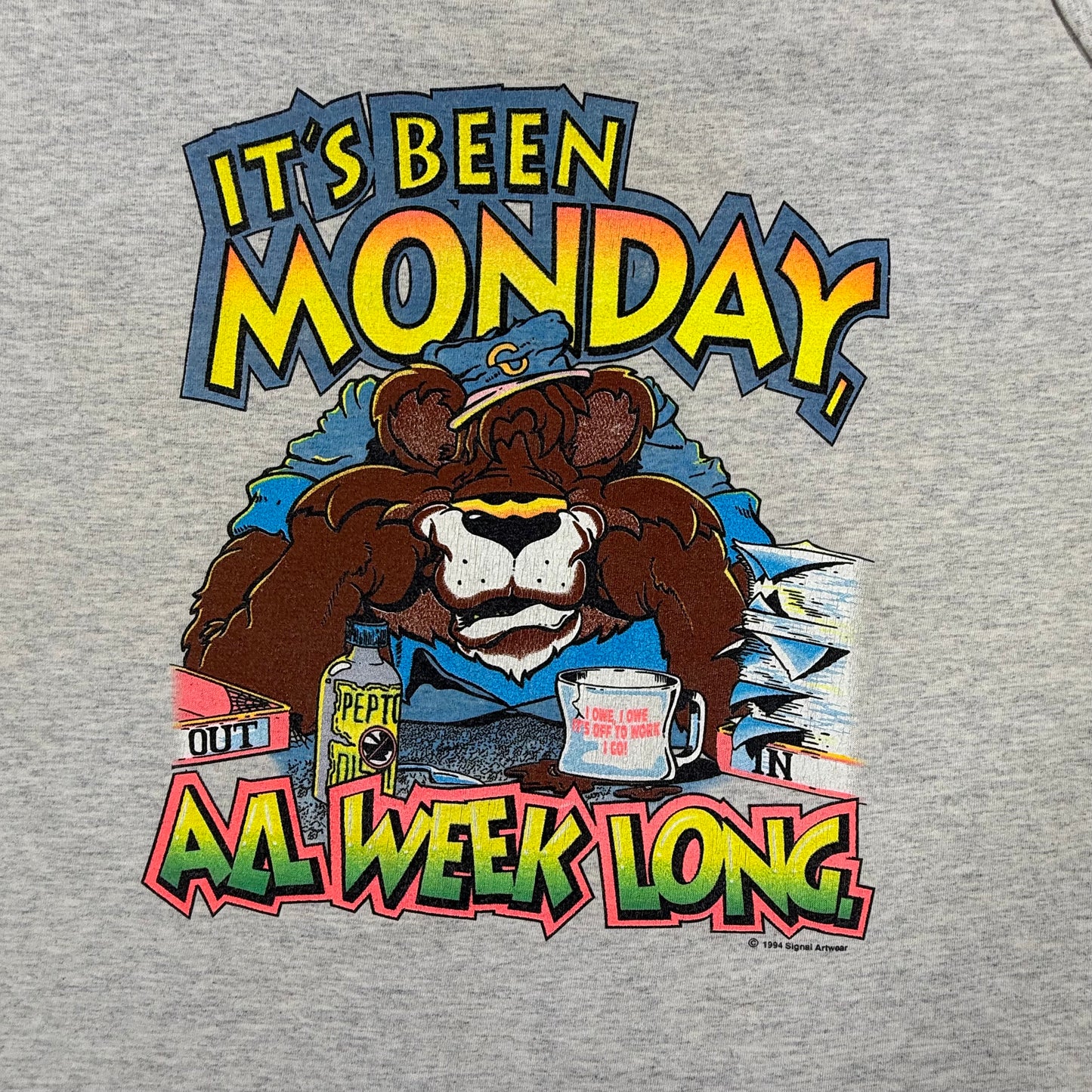 Gray sweatshirt with a cartoon bear and colorful text graphic on a gray background